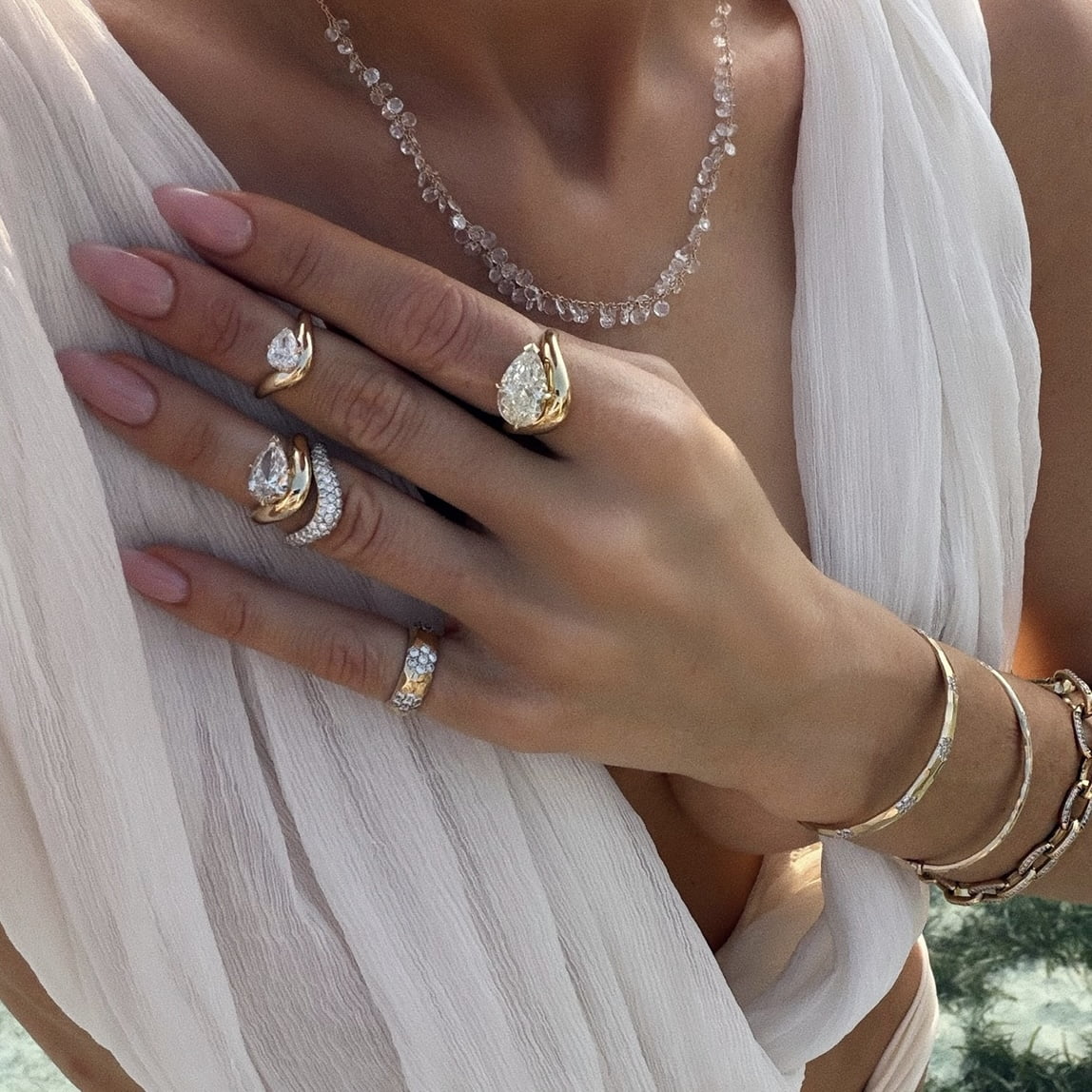 Enigma Floating Petite Pear Diamond Ring by Logan Hollowell Jewelry