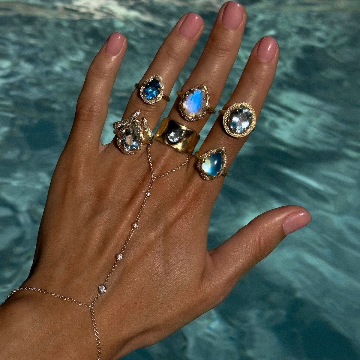Queen Water Drop Aquamarine Ring with Sprinkled Diamonds by Logan Hollowell Jewelry