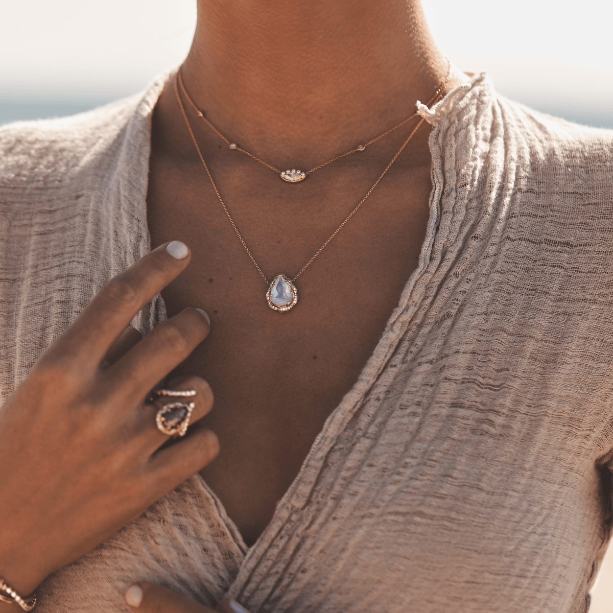 Queen Water Drop Moonstone Necklace with Full Pavé Diamond Halo by Logan Hollowell Jewelry