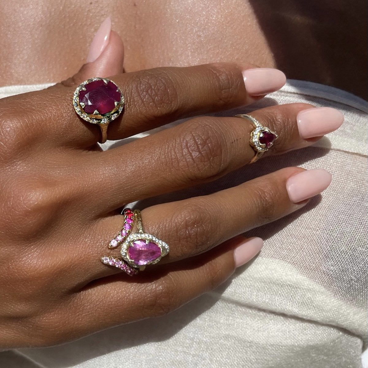 Baby Queen Water Drop Pink Sapphire Ring with Sprinkled Diamonds by Logan Hollowell Jewelry