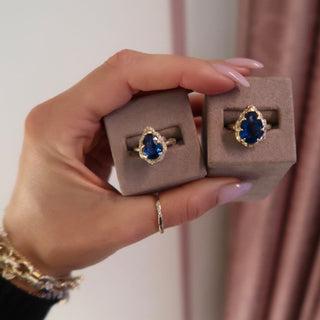 Queen Water Drop Premium Sapphire Ring with Sprinkled Diamonds by Logan Hollowell Jewelry