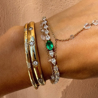 Diamond Water Drop Tennis Bracelet with Emerald Center by Logan Hollowell Jewelry