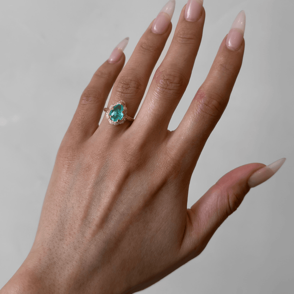 Baby Queen Water Drop Paraiba Ring with Full Pavé Diamond Halo by Logan Hollowell Jewelry
