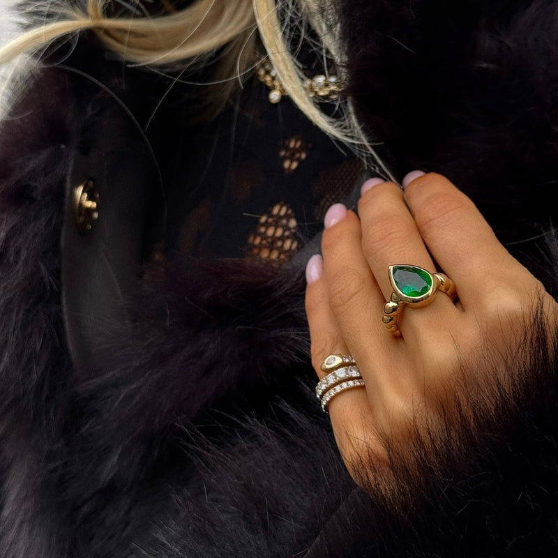 Tilted Water Drop Emerald Nautilus Ring by Logan Hollowell Jewelry