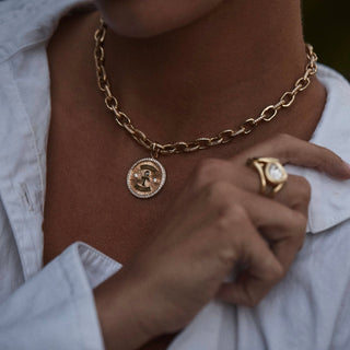 Diamond Ankh Coin with Pavé Border by Logan Hollowell Jewelry