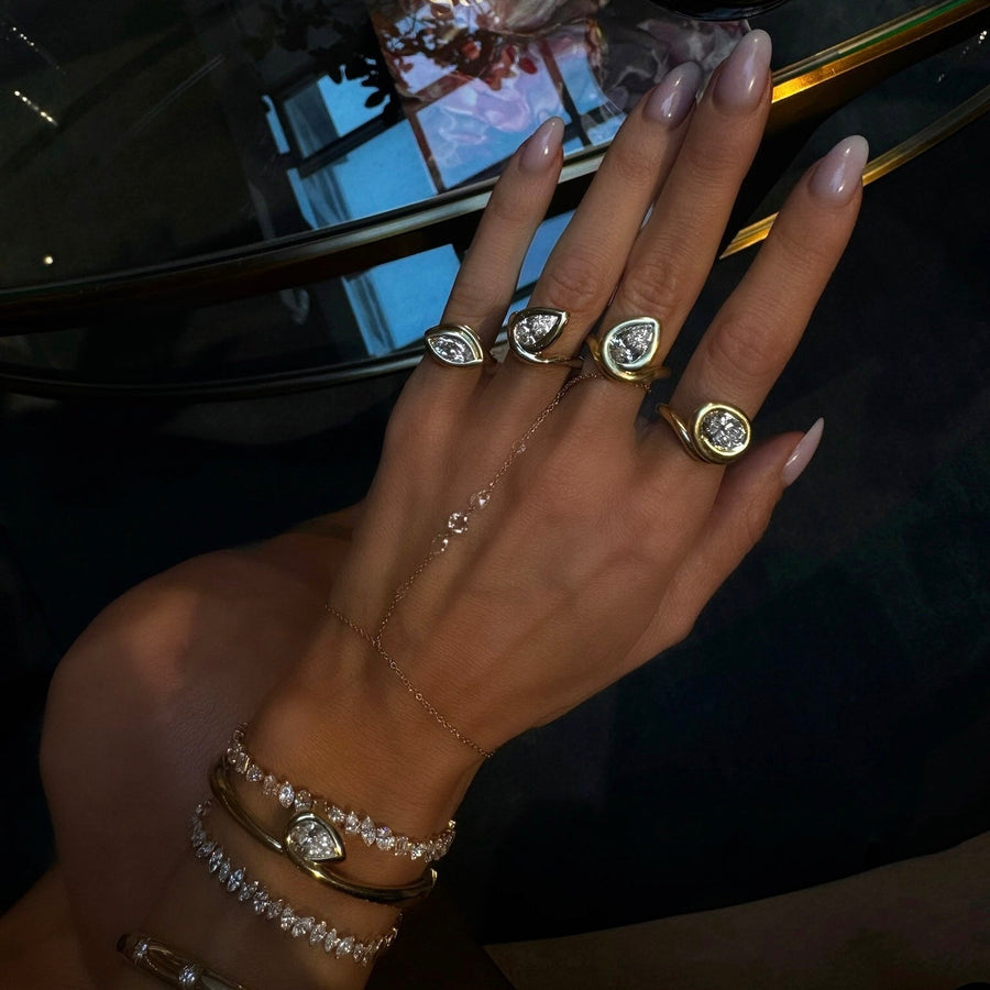 Enigma Water Drop Diamond Ring by Logan Hollowell Jewelry