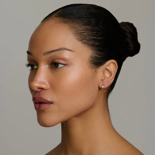 Single Star Set Rounded Diamond Huggies by Logan Hollowell Jewelry