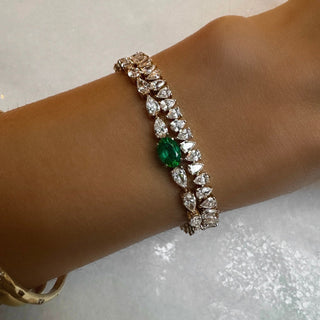 Diamond Water Drop Tennis Bracelet with Emerald Center by Logan Hollowell Jewelry
