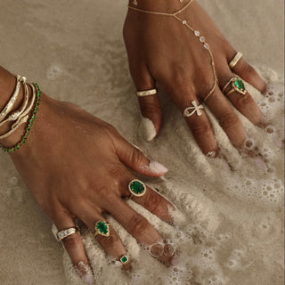 Queen Oval Zambian Emerald Ring with Full Pavé Diamond Halo by Logan Hollowell Jewelry