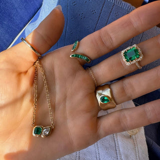 Queen Emerald Cut Emerald Ring with Full Pavé Diamond Halo by Logan Hollowell Jewelry