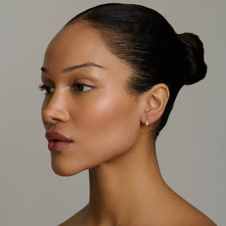 Petite Water Drop Diamond Huggies by Logan Hollowell Jewelry