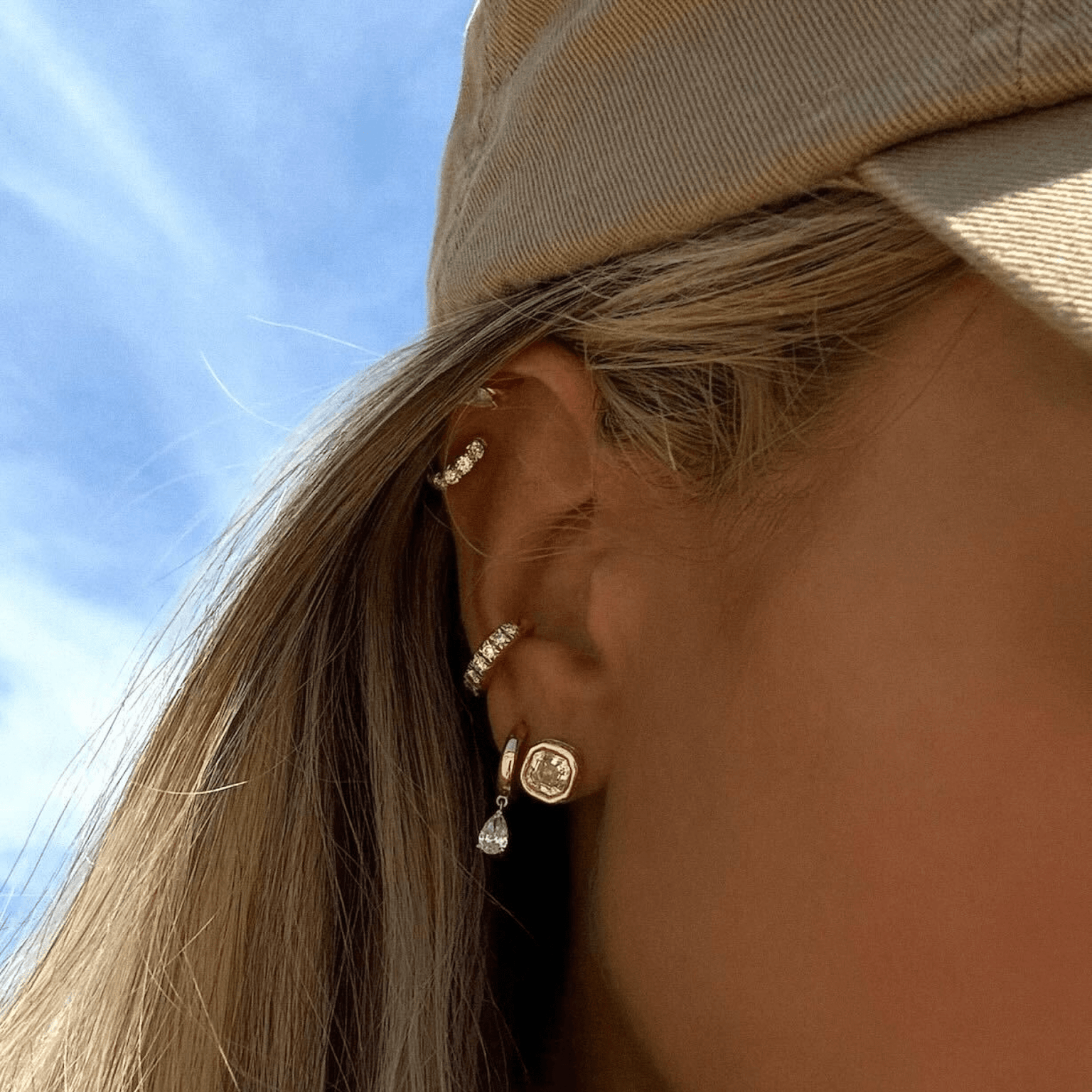 Pear Drop Diamond Huggies    by Logan Hollowell Jewelry