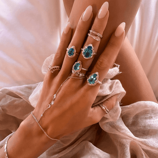 Baby Queen Water Drop Blue Topaz Ring with Full Pavé Halo    by Logan Hollowell Jewelry