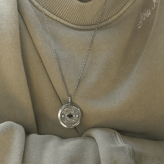 Men’s Sterling Silver Eye of Protection Coin Pendant    by Logan Hollowell Jewelry