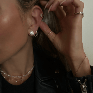 Pavé Halo Diamond Trillion Studs    by Logan Hollowell Jewelry