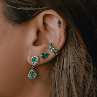 French Pave Graduated Emerald Ear Cuff    by Logan Hollowell Jewelry