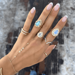 Diamond Kundalini Coil Ring    by Logan Hollowell Jewelry