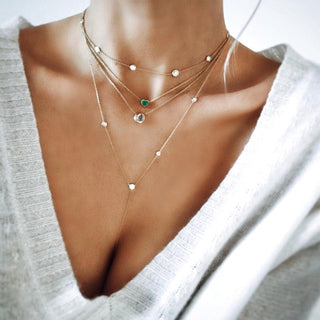 Floating Heart Shaped Emerald Necklace    by Logan Hollowell Jewelry